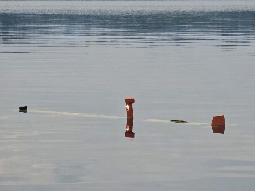 Once submerged, the vehicle is on its own, a lone acoustic mast on open water, beyond reach.